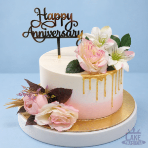 Blush Floral & Gold Drip Anniversary Cake